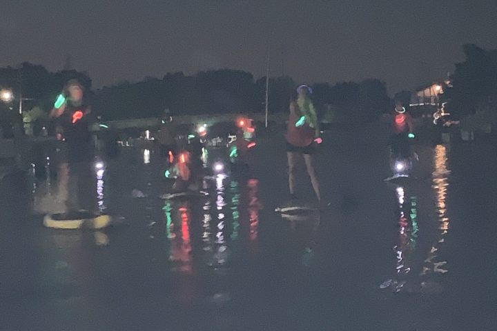 a group of people at night
