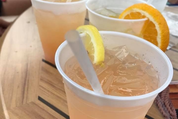 a cup of coffee and a glass of orange juice