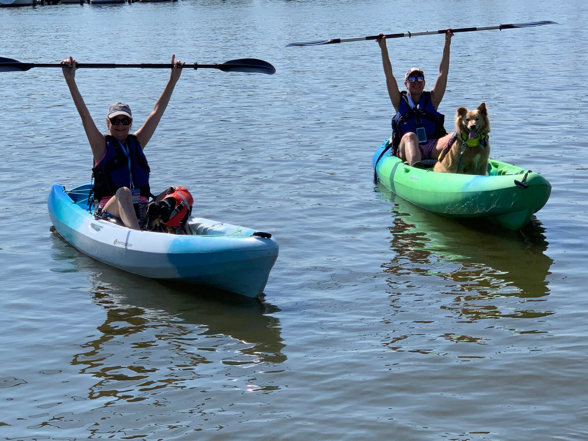 a group of people on a boat in the water